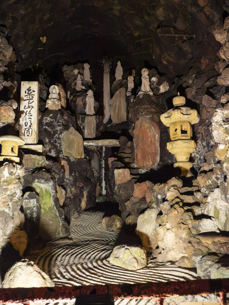 Step into an underground world where Buddhist paintings come to life in stone, carved with meticulous care over a lifetime of dedication.