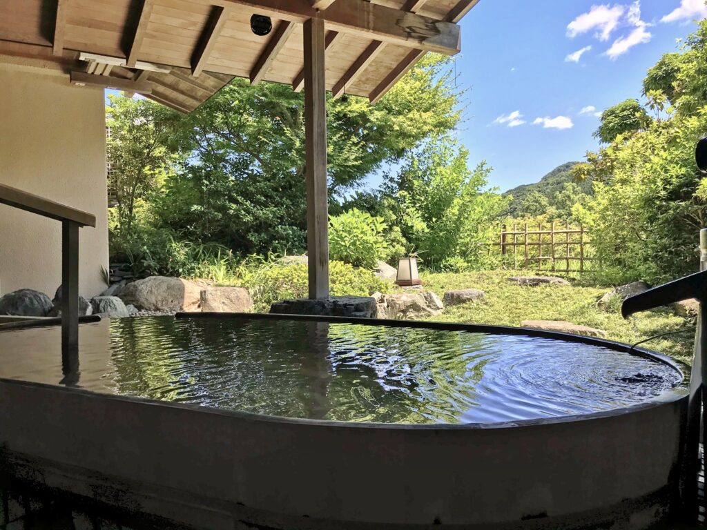 Experience Nagatoro at ease through river-facing rooms, seasonal baths, local cuisine, and strolls through flower-filled gardens.