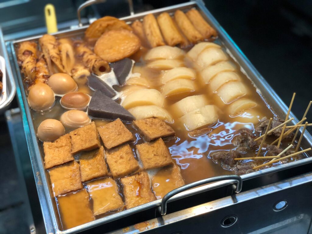 Experience Japanese izakaya culture and street snacks